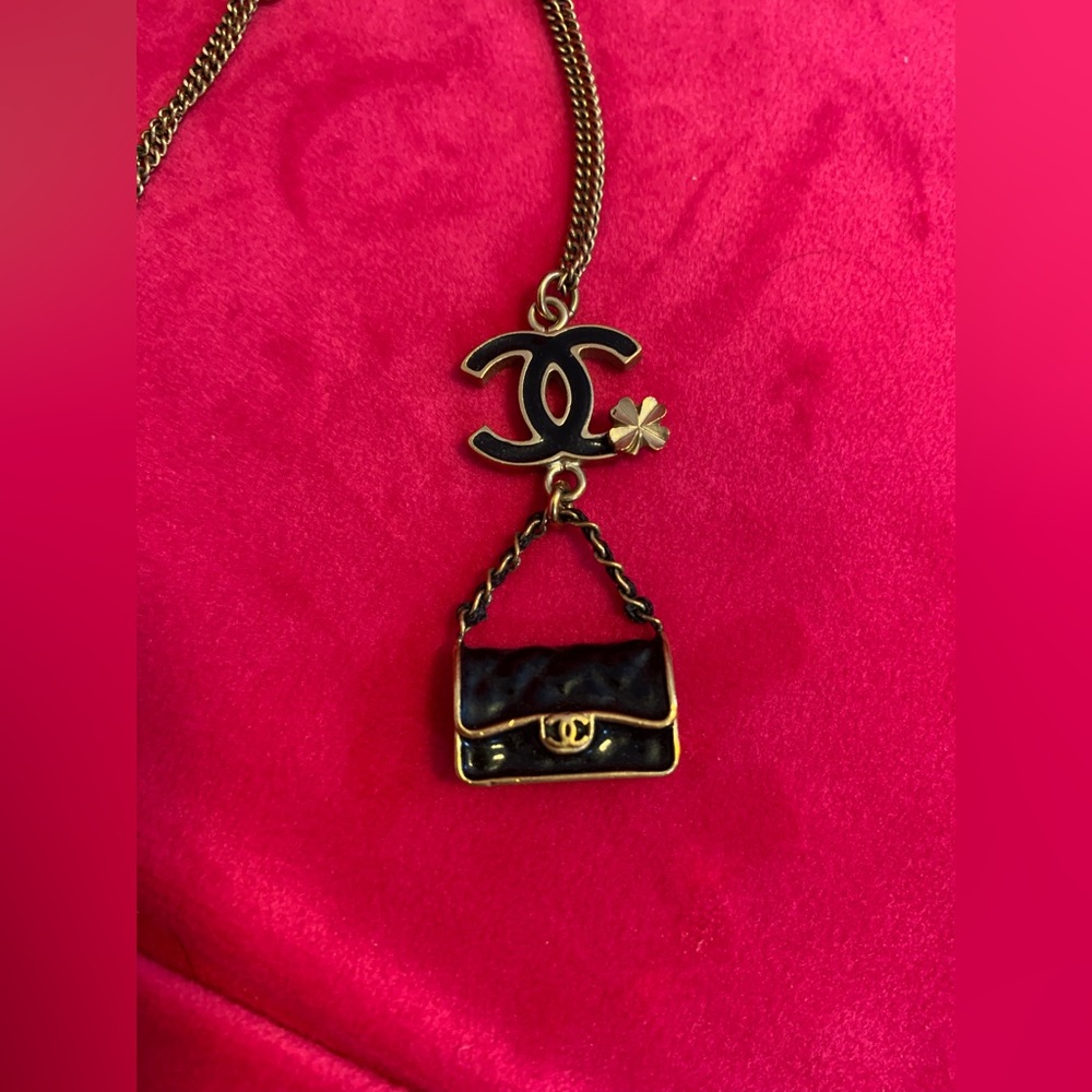Authentic CHANEL CC mini purse gold and black necklace.